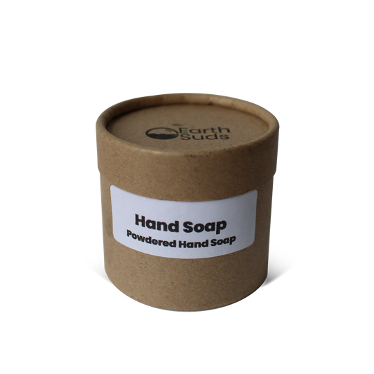 Cardboard container with "Powdered Hand Soap" label and waterless unscented soap inside.